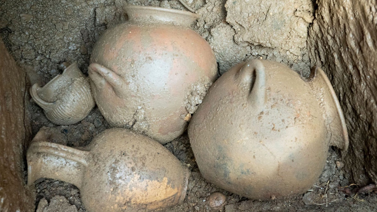 Close-up of ceramics left as burial offerings