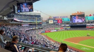 Yankees fans break out in 'USA' chants as Trump arrives
