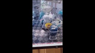 Russian doctors hold onto patient as earthquake hit during surgical procedure