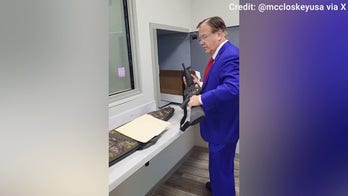 Mark McCloskey picks up his AR-15 from the police department