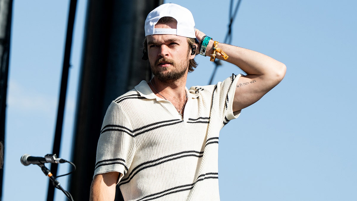 Conner Smith performing on stage at Stagecoach in 2025.