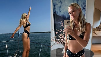 Molly Sims shows off figure in polka dot bikini during family yacht day